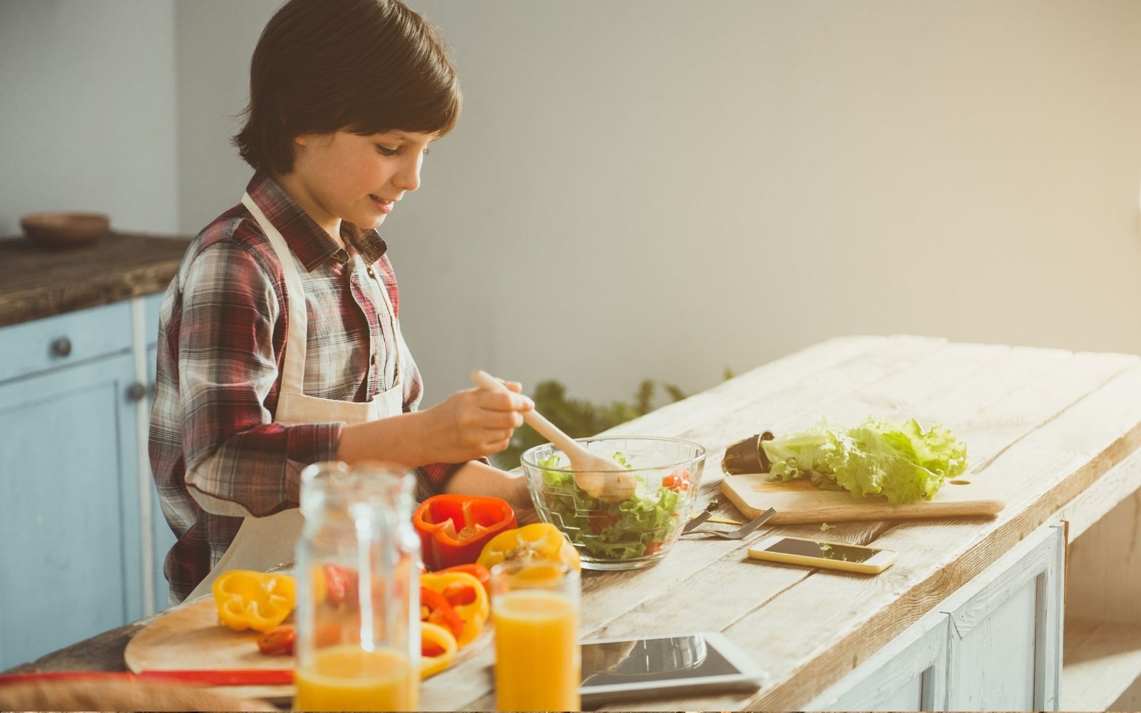 Kid making a salad