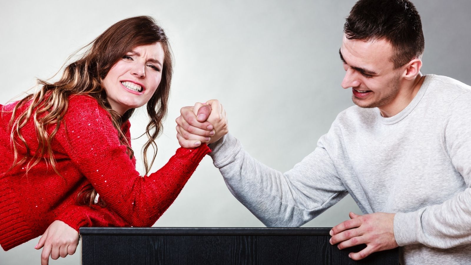 Couple arm wrestling challenge